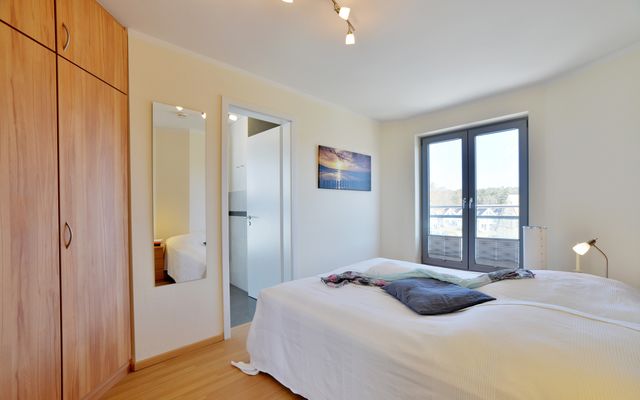 Schlafzimmer mit angrenzendem Bad